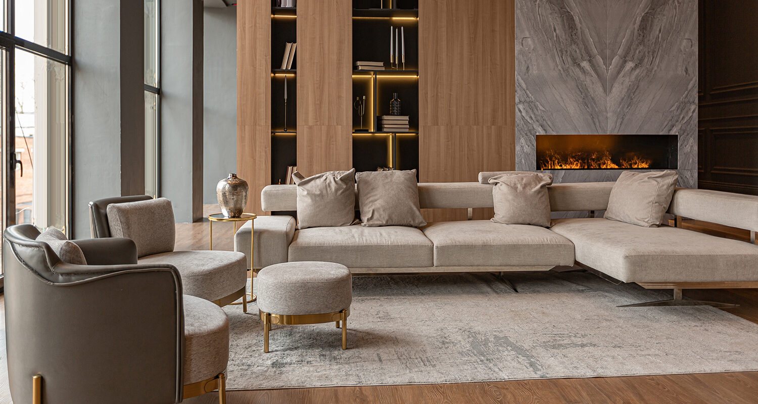 living room, marble wall fireplace and stylish bookcase to the ceiling in a chic expensive interior of a luxurious country house with a modern design with wood and led light, gray furniturу